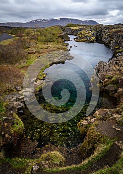 Lake full of coins in Pingvellir national park, Iceland