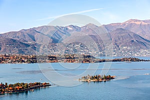 Lake Garda coastline and small Rabbit Island on a sunny autumn day