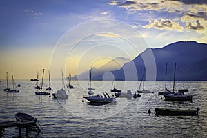 Lake Garda Harbour at sunset with boats