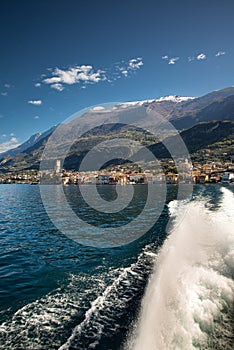 Lake - lago - Garda, Italy. Town of Malcesine, lakeside resort. Old harbour photo