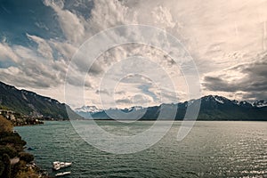 Lake Geneva and snow capped mountains in Switzerland