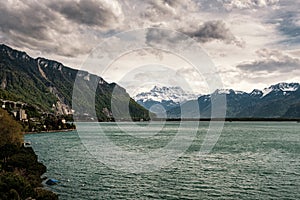 Lake Geneva and snow capped mountains in Switzerland