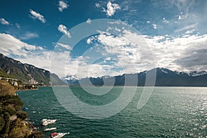 Lake Geneva and snow capped mountains in Switzerland