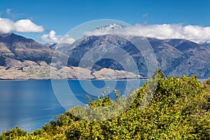 Lake Hawea view and high mountains in the clouds, New Zealand