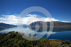 Lake Hayes Mirror lake in the mountains South Island New Zealand