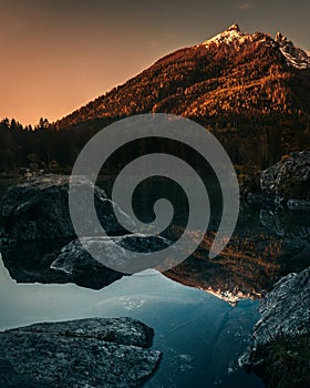 lake hintersee during spring with mountain reflection