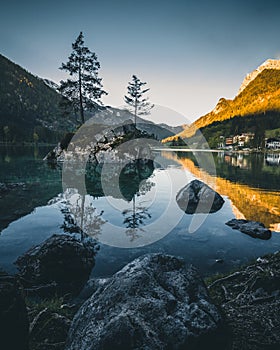 lake hintersee during spring with mountain reflection