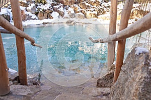 Lake with ice water in winter for cooling after sauna