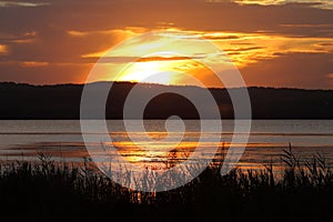 Coastal landscape by golden sunset atmospheric mood photo
