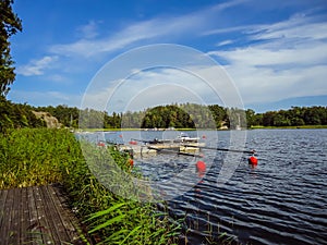 Lake of an island in Stockholm Archipelago, on a beautiful sunny summer day in Sweden photo