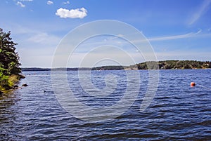 Lake of an island in Stockholm Archipelago, on a beautiful sunny summer day in Sweden photo