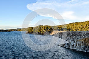 Lake Jindabyne in the shadows of mountain range and cloudscape