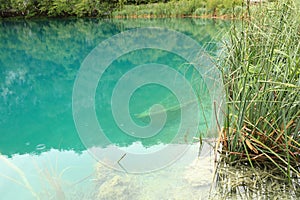 Lake Kaliderovac with sank boat on Plitvicka Jezera in Croatia