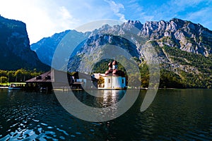 Lake Koenigsee with alpine views and st. Bartholoma Church