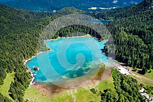 Lake Lago di Fusine Superiore Italy Alps. Aerial FPV drone flights. photo