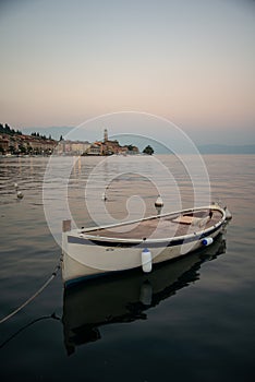Lake - lago - Garda, Italy. Town of  SalÃ², lakeside promenade at sunset