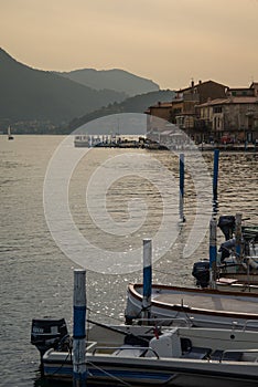 Lake lago Iseo, Italy. Peschiera Maraglio harbour on Monte Isola photo