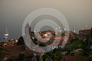 Lake - lago - Maggiore, Italy. Town of Belgirate at sunset