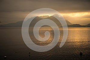 Lake - lago - Maggiore, Italy : winter sunrise. Laveno mountain, Lombardy