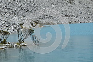 Lake Laguna 69 and Chakraraju mountain are situated in the Huascaran National Park in the Andes of Peru