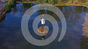 Lake lamp reflection in a artificial lake