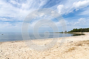 Lake landscape in Finland, boat and beach