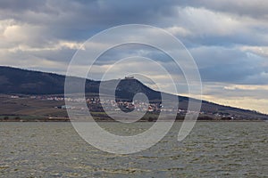 The lake landscape of Musov Czech Republic. View of Lake Musovske and Palava in the Czech Republic. Ice floes in the foreground.