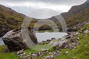 Lake and Large Rock in Dunloe Pass