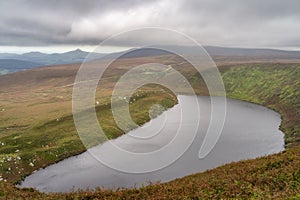 Lake Lough Bray, Sugarloaf and mountain range in Wicklow Mountains