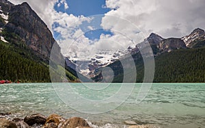 Lake Louise in Banff National Park, Alberta, Canada. Lake Louise panorama of snow-capped mountain peaks, coniferous forest