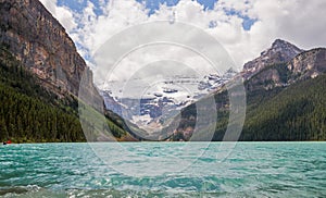 Lake Louise in Banff National Park, Alberta, Canada. Lake Louise panorama of snow-capped mountain peaks, coniferous forest