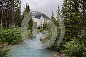 Lake Louise, Banff National Park, Alberta, Canada tourism. Snow covered Rocky Mountain lake landscape panorama without peopl