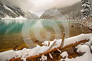 Lake Louise British Columbia at sunrise during the winter with fresh snow