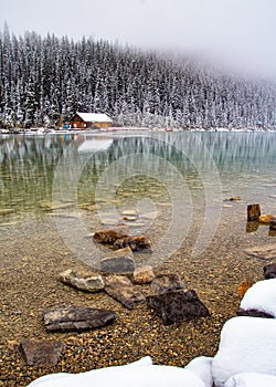 Lake Louise British Columbia at sunrise during the winter with fresh snow