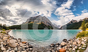 Lake Louise with rocky mountains and blue sky in sunny at Banff national park