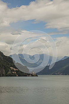 Lake Lugano - summer in Switzerland - mountains and clouds.