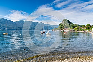 Lake Maggiore, Calde, Italy. One of the most charming corners of Lake Maggiore on a beautiful summer day. Vacation on the lake. photo