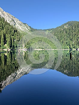 Lake Malaya Ritsa in summer in sunny weather, Abkhazia