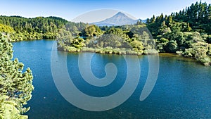 Lake Mangamahoe scenic view with vmount Taranaki in the background