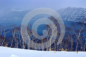 Lake Mashu, endorheic crater lake formed in the caldera of a potentially active volcano, Akan National Park Volcano, Hokkaido, Ja photo