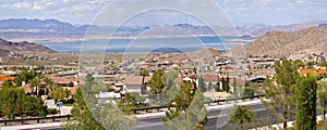 Lake Meade Bolder City Nevada suburb and mountains panorama. photo