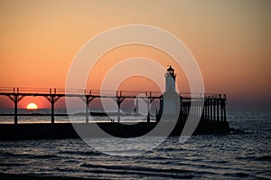 Lake michigan sunset lighthouse