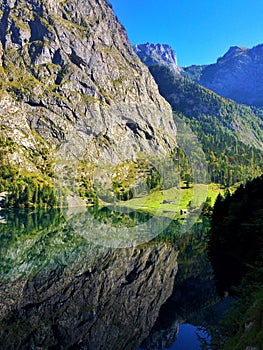 Lake in the middle of the mountains with beautiful reflections in the water