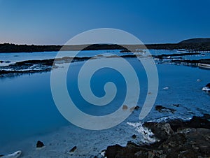 A lake with milky thermal water in Grindavik