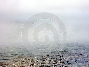 Lake with mist in the background.