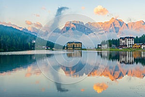 Lake Misurina in Dolomites mountain, Italian Alps, Belluno, Italy. Alpine Lago di Misurina with reflection at sunrise photo