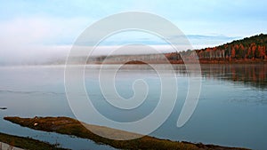 Lake with morning fog