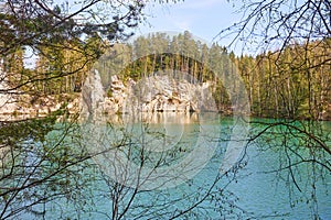 A lake with a mountain in the background