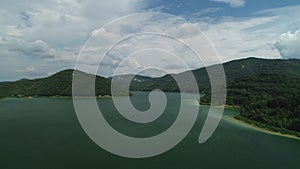 Lake between mountain hills aerial view. Water Reservoir dam panorama, nature of Bulgaria