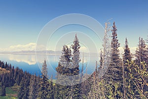 Lake and mountain landscape under blue sky